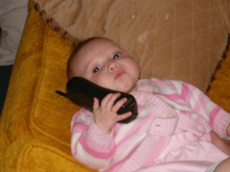 2005-05-15-nicolexanna-Gig phone with Grammy.JPG